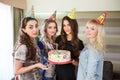 Birthday. Girls posing with cake on birthday