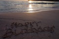 Birthday greeting written in the sand Royalty Free Stock Photo