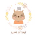 Birthday. happy raccoon in a wreath. portrait of baby animal