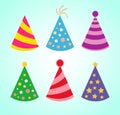 Birthday hats. Birthday caps. Colored holiday hats isolated on blue bacground. Vector set for decoration