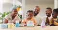 Birthday, kids party and applause with a black family in celebration of a girl child in their home. Parents Royalty Free Stock Photo