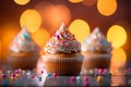 Birthday magic cupcakes and colorful balloons in a whimsical blur