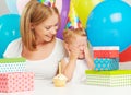 Birthday. mom, baby daughter, balloons, cake, gifts Royalty Free Stock Photo