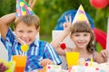 Birthday party with colorful cake at backyard