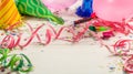 Birthday party. Confetti and serpentines on wooden background Royalty Free Stock Photo