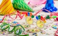 Birthday party. Confetti and serpentines on wooden background Royalty Free Stock Photo