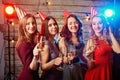 Birthday party girlfriends. Beautiful girl in a cap with glasses Royalty Free Stock Photo