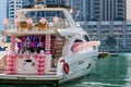 Birthday party on luxury yacht. Festive sailboat with white and pink balloon decorations for a birthday celebration.