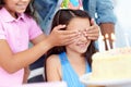 Birthday party surprise, cake and happy children celebrate special event with friends, kids and dessert food. Wow Royalty Free Stock Photo