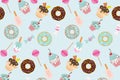 Birthday seamless pattern with sweets on pastel blue