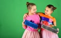 Birthday surprise concept. Sisters with wrapped gift boxes Royalty Free Stock Photo