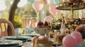 Birthday table decoration with sweets, flowers, candles and pink balloons Royalty Free Stock Photo