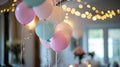 Birthday table decoration with sweets, flowers, candles and pink balloons Royalty Free Stock Photo