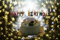 Birthday cake and colorful candles on star bokeh background Royalty Free Stock Photo
