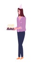Birthday woman with a cake ready to celebrate. Happy girl in paper cap on birthday party celebration Royalty Free Stock Photo