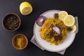 Biryani with chicken. Traditional Indian dish of rice and chicken, with spices and lemon. Royalty Free Stock Photo