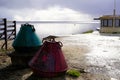 Biscarrosse lake beach water in cloudy day sunrise with large big boat buoy