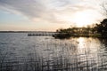 Biscarrosse lake at sunset with boat pontoon in france