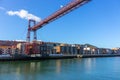 Biscay bridge flying with gondola over river Nervion. Portugalete landmark. Famous bridge called Puente de Vizcaya near Bilbao.