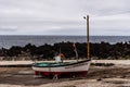 Fishing boat at the dock of the small harbor of Biscoitos in Terceira Island