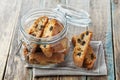 Biscotti or cantucci with raisins on wooden rustic table, traditional Italian biscuit