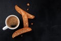 Biscotti. Italian almond biscuits with a cup of coffee, shot from above Royalty Free Stock Photo