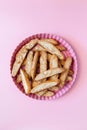 Biscotti with nuts on pink background. Delicious cantucci cookies. Cantuccini. Traditional italian homemade biscuits. Royalty Free Stock Photo