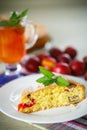 Biscuit cake with cherry plums Royalty Free Stock Photo