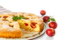 Biscuit cake with cherry plums Royalty Free Stock Photo