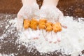 Biscuit cookies alphabet word FRESH on kid hands