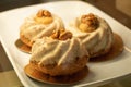 Biscuit cupcakes with caramel syrup and nuts