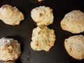 Biscuits with cheese on metal baking tray Royalty Free Stock Photo