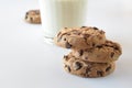 Biscuits with chocolate chips inside and milk. Royalty Free Stock Photo