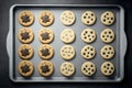 biscuits and cookies baking tray on large baking sheet Royalty Free Stock Photo
