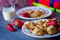 Biscuits, cornflakes, strawberry and raisins