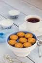 Biscuits and a cup of tea on a wooden table Royalty Free Stock Photo