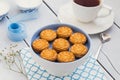 Biscuits and a cup of tea on a wooden table Royalty Free Stock Photo