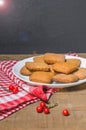 Biscuits and milk on a red napkin in Christmas decor with free space