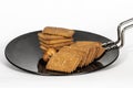 Biscuits In Non Stick Pan, On White Background Royalty Free Stock Photo