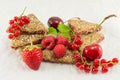 Biscuits with strawberry currant and cherry Royalty Free Stock Photo
