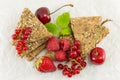 Biscuits with strawberry currant and cherry Royalty Free Stock Photo
