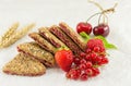 Biscuits with strawberry currant and cherry Royalty Free Stock Photo