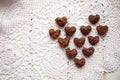 Biscuits, sweets laid out in a heart shape