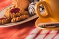 Biscuits wit cup of tea with decoration Royalty Free Stock Photo