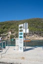 Bisevo, Croatia - Aug 16, 2020: Tourist queue information board in komoza blue cave attraction