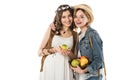 Bisexual hippie couple with fruits embracing isolated on white