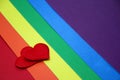 Rainbow homosexual color background with red hearts