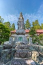 Bisho Kannon Smiling statue at gansho-in buddhist temple in Obuse, Japan Royalty Free Stock Photo