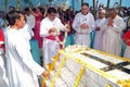 Bishop Shyamal Bose leads prayer at the tomb of Croatian missionary, Jesuit father Ante Gabric in Kumrokhali, West Bengal, India