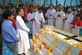 Bishop Shyamal Bose leads prayer at the tomb of Croatian missionary, Jesuit father Ante Gabric in Kumrokhali, West Bengal, India